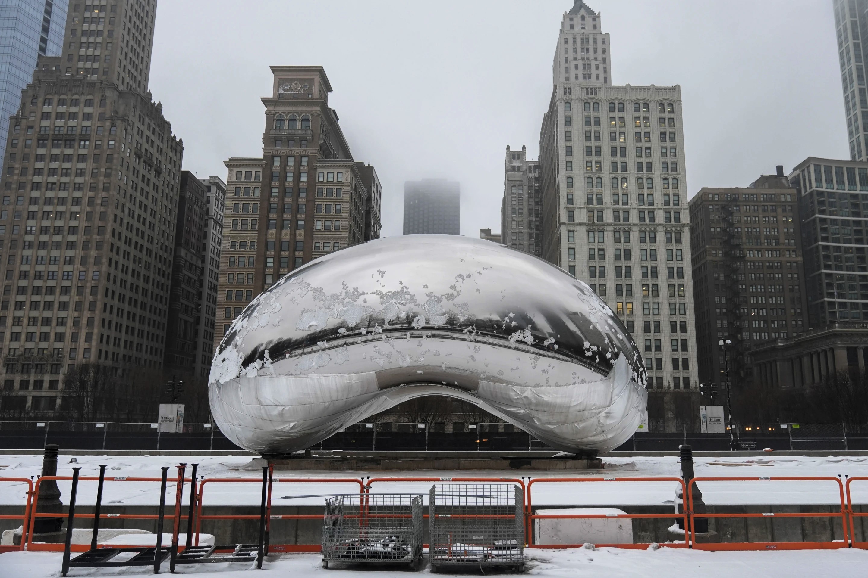 photo: cloud gate structure covered in snow, chicago